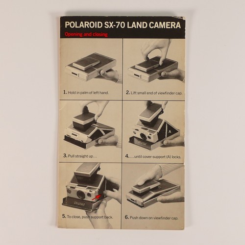 1154 - Polaroid SX-70 Land Camera. Chrome and tan covering. Includes original inserts. In Keystone leather ... 