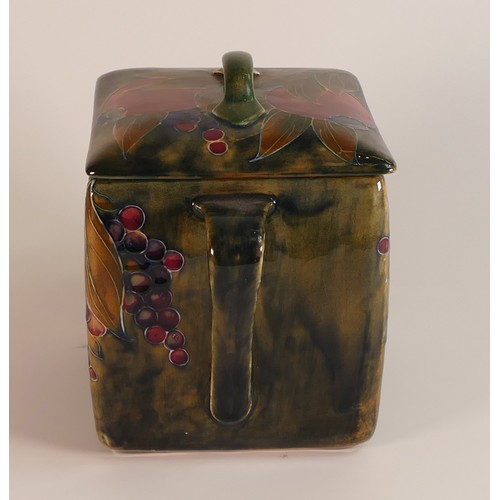 1198 - William Moorcroft two handled Biscuit Barrel & cover, in the Arts & Crafts pomegranate design, c1915... 