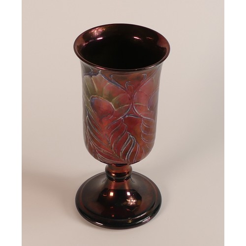 1202 - William Moorcroft unusual chalice, decorated in the Peacock Feather design with unusual copper lustr... 