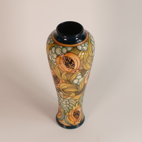 1255 - Moorcroft vase, Garnet Apple designed by Rachel Bishop. Decorated in a different colourway for a Moo... 