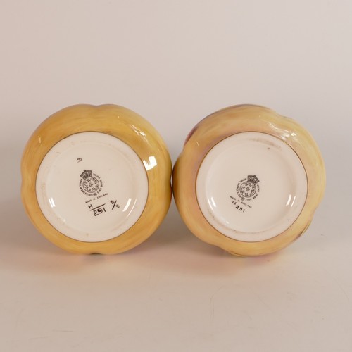 1270 - A pair of Royal Worcester Potpourri jars & covers, gilded and hand painted with fruit, one signed J ... 