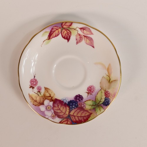 1278 - Royal Worcester gilded coffee can & saucer, decorated with fruit.