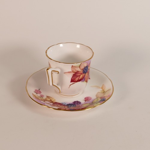 1278 - Royal Worcester gilded coffee can & saucer, decorated with fruit.