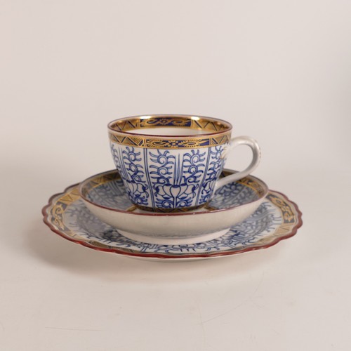 1296 - Royal Worcester, Royal Lily pattern trio together with a shallow bowl. Diameter of bowl: 20cm