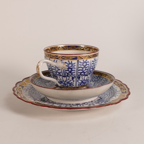 1296 - Royal Worcester, Royal Lily pattern trio together with a shallow bowl. Diameter of bowl: 20cm