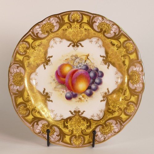 1316 - Royal Worcester, two hand painted floral still life cabinet plates. Yellow ground border with heavil... 