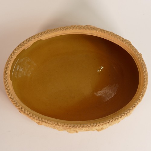 1346 - Wedgwood, Caneware Game Pie dish, moulded with game trophies interspersed with grape vine swags, fur... 