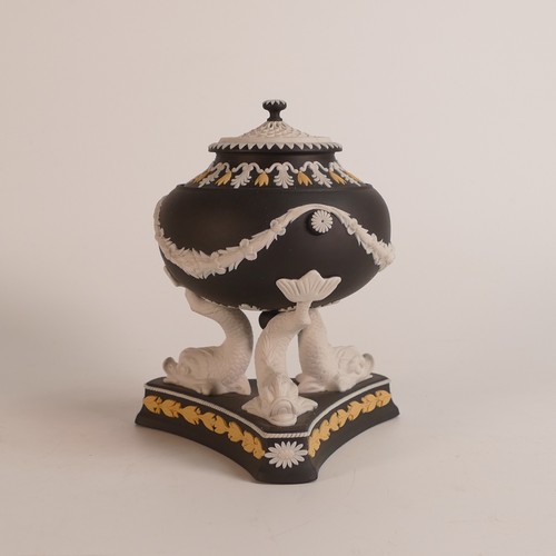 1347 - Wedgwood, tri-colour Jasperware Pastille burner. Reticulated lid on squat bowl upon dolphin supports... 