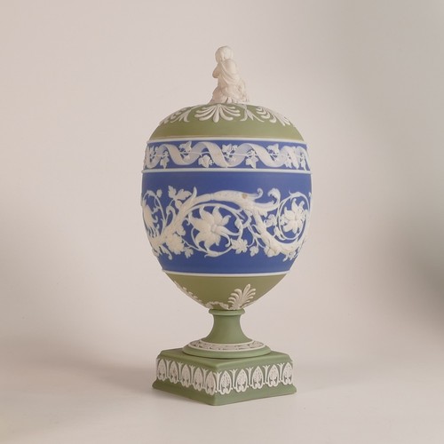 1366 - Wedgwood, early tri-colour lidded Arabesque vase. The body, of dip blue Jasperware with intricate sc... 