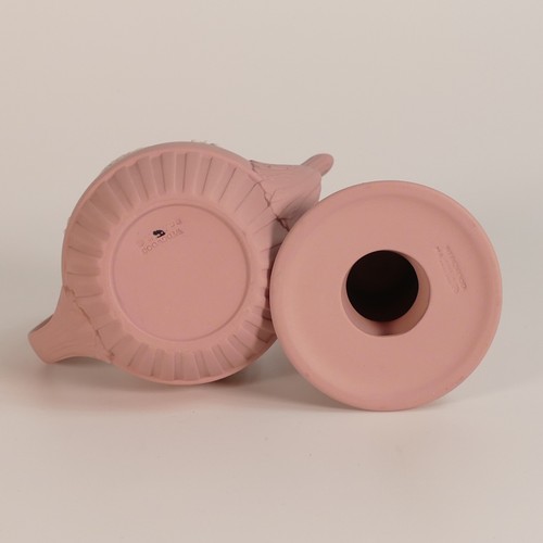 1393 - Wegdwood, eight pink Jasperware items including miniature tea pot, trinket pots, candlestick and dis... 