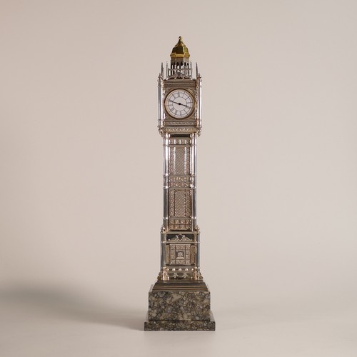 1419 - Mappin & Webb, London 2008. An Elizabeth II Silver desk timepiece modelled as Big Ben, the Palace of... 