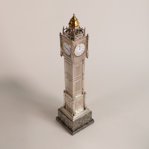 1419 - Mappin & Webb, London 2008. An Elizabeth II Silver desk timepiece modelled as Big Ben, the Palace of... 