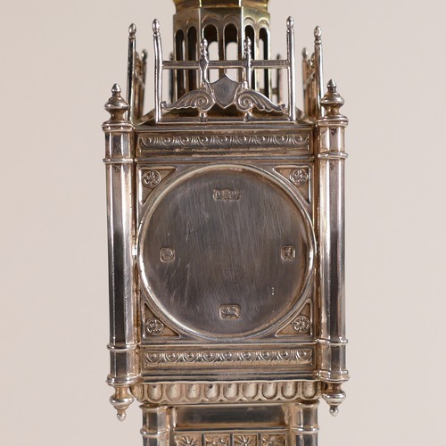 1419 - Mappin & Webb, London 2008. An Elizabeth II Silver desk timepiece modelled as Big Ben, the Palace of... 