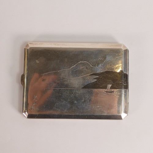 1421 - .950, Japanese export Niello Silver cigarette case. Decorated with cloud obscured Mt. Fuji above a f... 