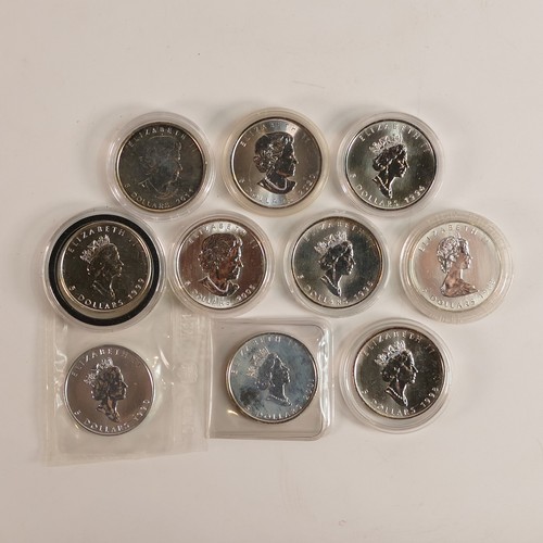 1465 - 10 x .999 fine silver CANADA Dollar coins, in capsules, dates as shown in photos.