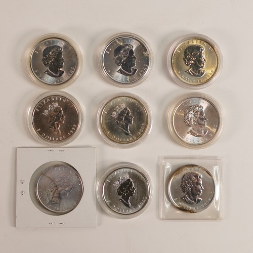 1466 - 9 x .999 fine silver CANADA Dollar coins, in capsules, dates as shown in photos.