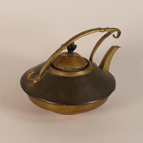 855 - In the manner of Christopher Dresser, Arts & Crafts Copper and Brass tea pot. Turned ebonised wooden... 