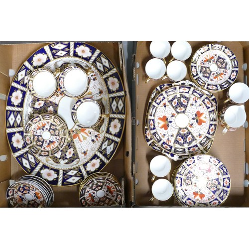 301A - Fifty three pieces of Royal Crown Derby 2451 Old Imari pattern dinner, tea and coffee ware, includin... 