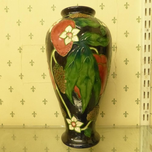 245 - Old Tupton Ware, Flower and Fruit Baluster Vase. Height: 28.5cm