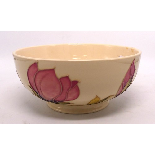 106 - Moorcroft fruit bowl decorated in the Magnolia pattern, diameter 20.5cm.