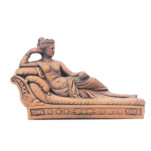 193 - Terracotta Grecian Type partially robed woman posing on a chaise lounge 36cm wide x 24cm tall