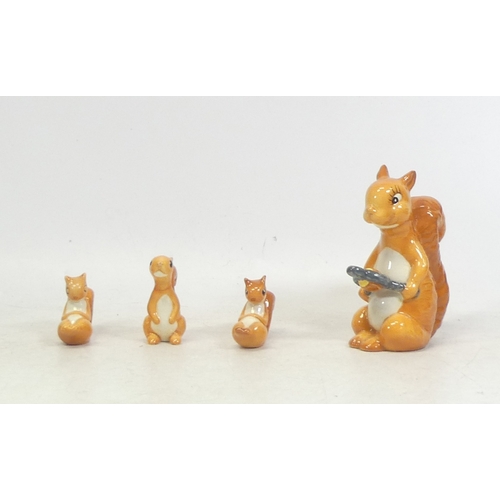 74 - Beswick, Four Comical models of Squirrel ( one with a slight crack to throat) (4)