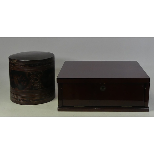 304 - Two Wooden Boxes to include a Burmese Yun Ware Lacquer type box  18cm high x 19cm dia also a polishe... 