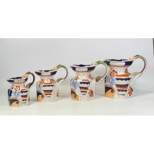 183 - Masons, Four 19th Century Ironstone Bethesda Pattern Graduated Jugs. One handle a/f (4)