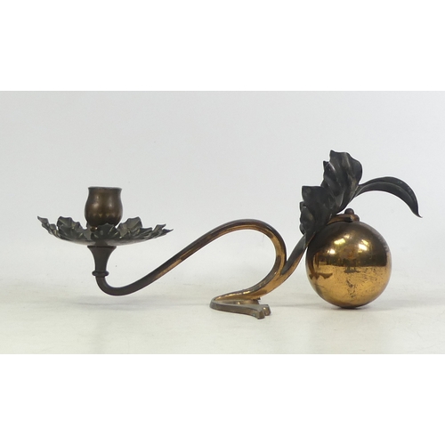 319 - A Heavy Patinated Metal Candlestick Holder. Height: 12cm