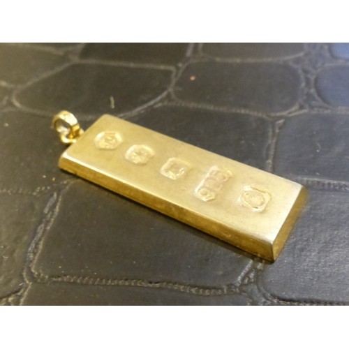 765 - 925 silver ingot pendant, 14.4g.