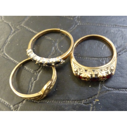 772 - Three stone set 9ct gold rings (one ring cut), combined 6.96g.