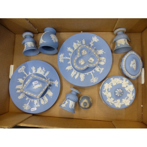 419 - Wedgwood jasper ware in powder blue to include a circular lidded box, small vases, wall plates etc (... 