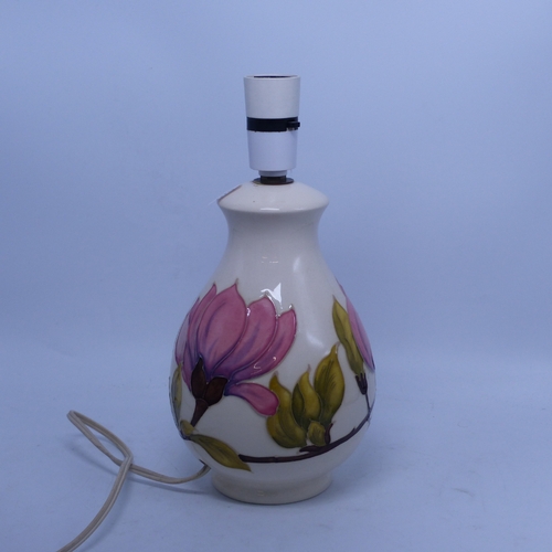 111 - Moorcroft table lamp in the Pink Magnolia pattern, height of ceramic base 20.5cm.