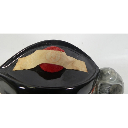 41 - Royal Doulton, Large Character Decanter William Grant with Dress Sword Handle. Contents sealed.