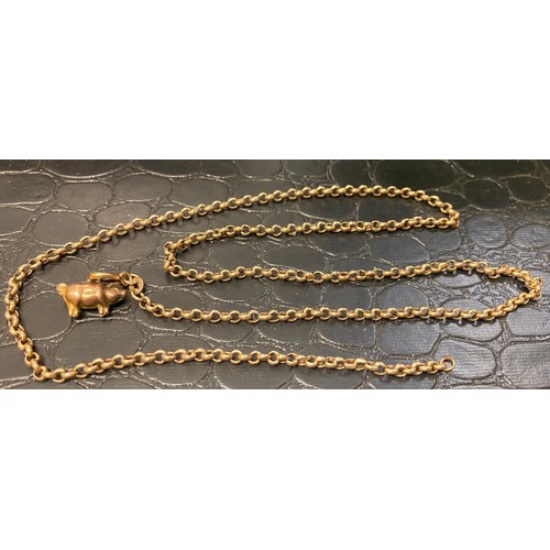 775 - 9ct gold necklace length 28cm, together with a charm in the form of a pig, combined 7.8g.