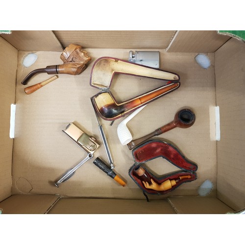 201 - Collection of vintage smoking accessories to include pipes, silver and amber cigarette holder, pipe ... 