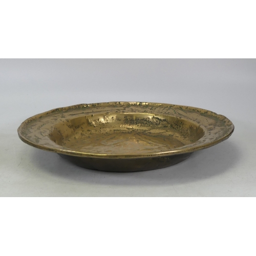 204 - A large Antique brass bowl with the markings B/H R.C 1615. (D: 33cm)
