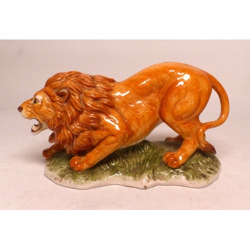 179 - Saxony ceramic Lion - Felis Leo figure, length 18cm.