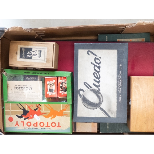 35 - A collection of boxed board games to include Totopoly horse racing game, Cluedo, Scrabble and chess ... 