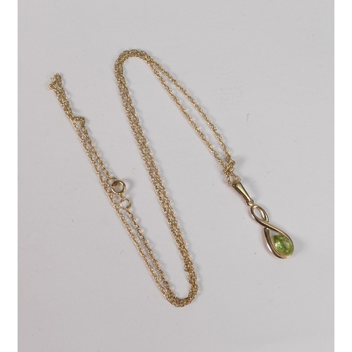 714 - 9ct gold pendant set with green stone and 9ct gold chain, 1g.