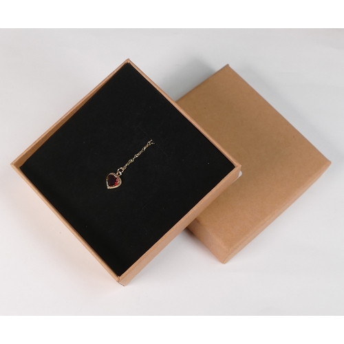 718 - 9ct gold heart shaped pendant set with brown stone and 9ct gold chain, 1.1g.