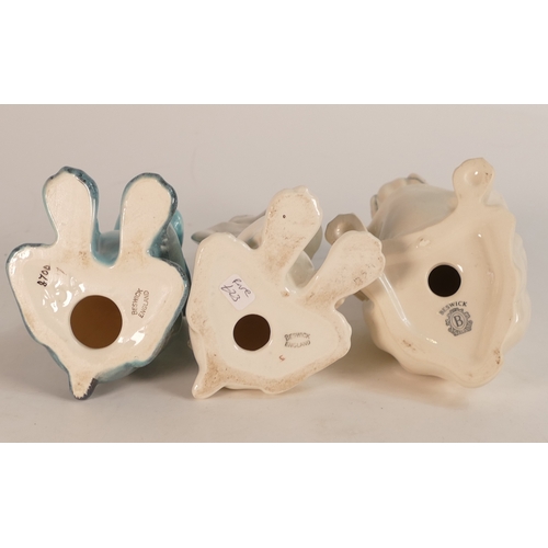 115 - Beswick Sitting Spaniels model no:- 454, two colourways, blue and white together with Sitting Britis... 