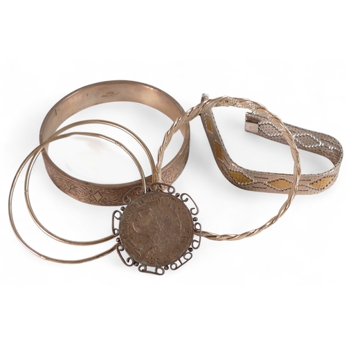 741 - A collection of Silver bangles, bracelet and 1849 French 5 franc coin made into a brooch, 122.5g.
