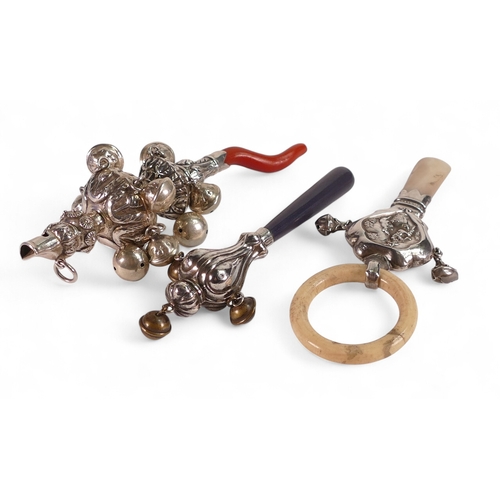 768 - 3 x silver mounted childs rattles, one with coral handle.