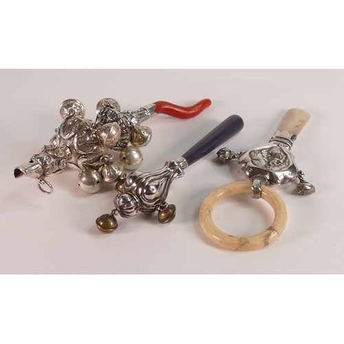 768 - 3 x silver mounted childs rattles, one with coral handle.