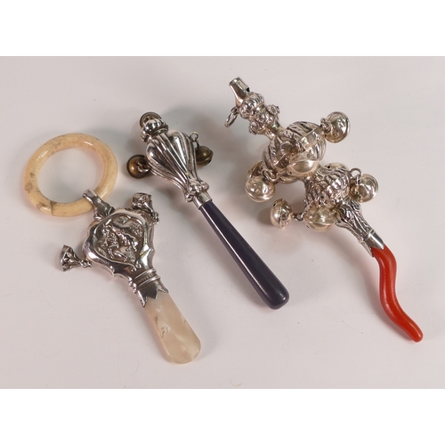 768 - 3 x silver mounted childs rattles, one with coral handle.
