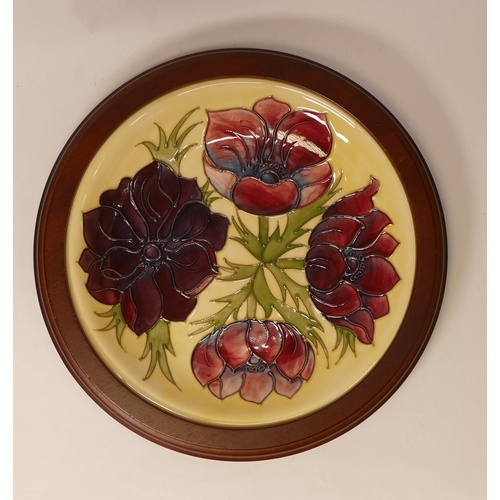 51 - Moorcroft Plate 783/10, 'Anemone' design on Cream ground measures 30cm including surround