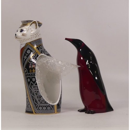 398 - Royal Crown Derby Diamond Jubilee Pearly King Cat and Royal Doulton flambe penguin, both a.f. (2)