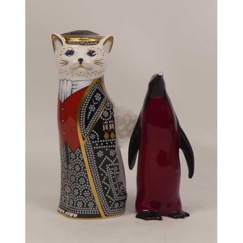 398 - Royal Crown Derby Diamond Jubilee Pearly King Cat and Royal Doulton flambe penguin, both a.f. (2)