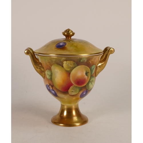148 - Coalport Hand painted footed lidded Urn with decorative gilt handles depicting a Fruit design with a... 